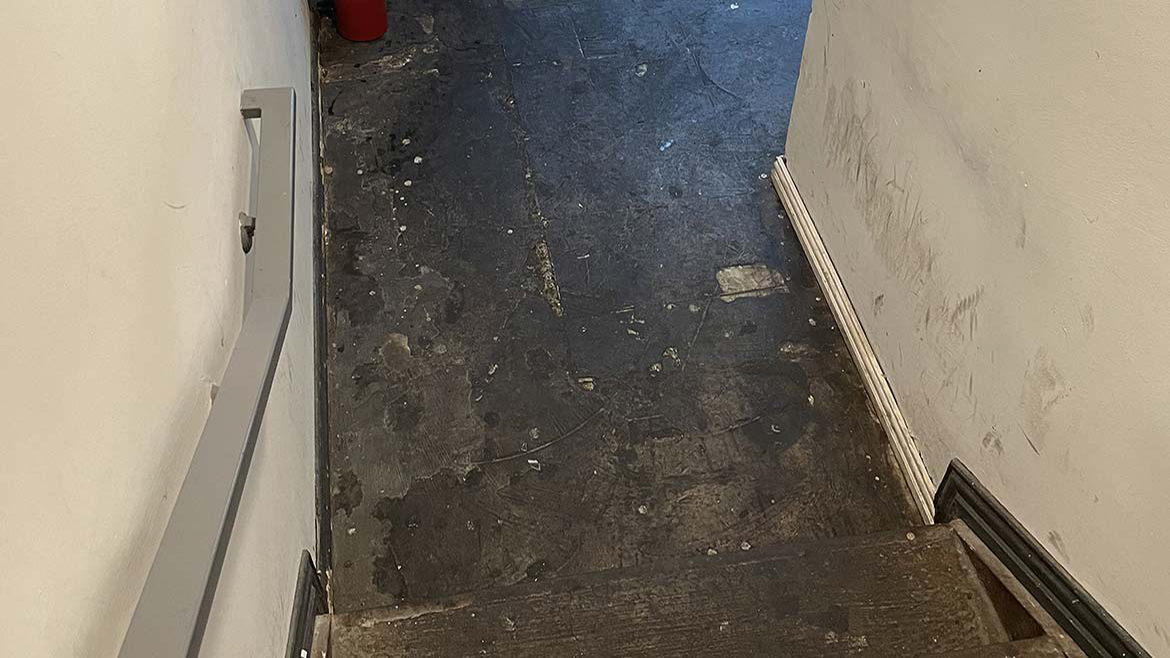 01 SW 1223 Restoration and Sustainability. Stairs leading to outside.