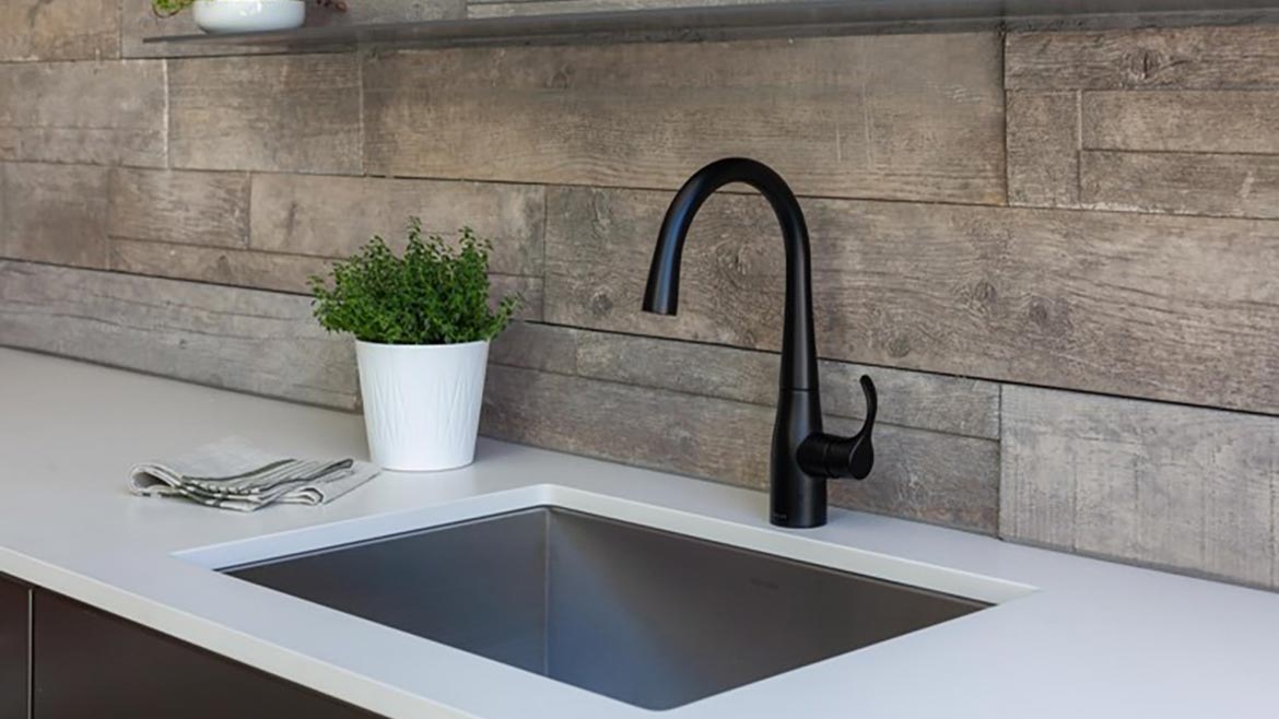 Mineral Surfacing Part 3: Close up of outdoor kitchen faucet